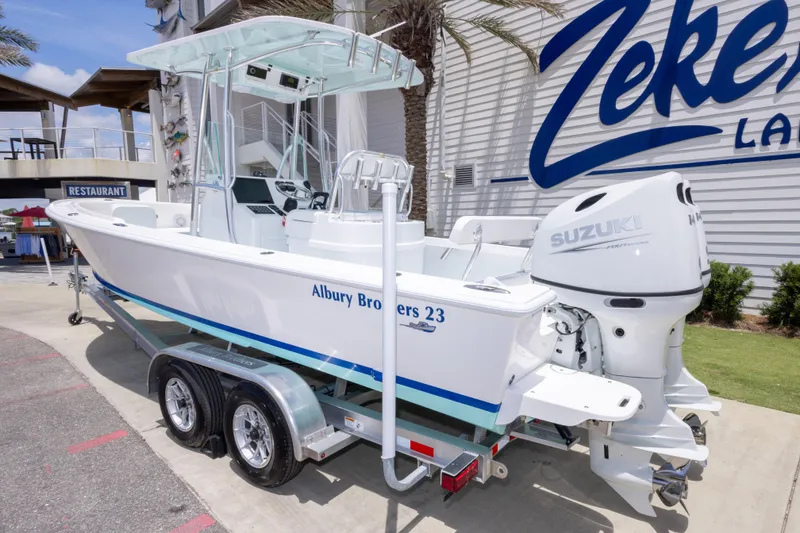 Slide: The Image of 2026 Albury Brothers 23 Forward Seating boat on trailer, parked near Zeke's Landing. - 11