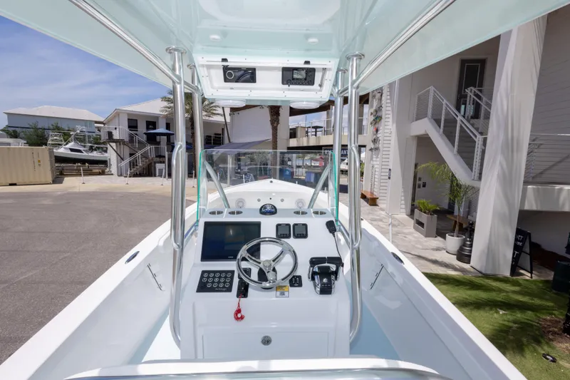 Slide: The Image of 2026 Albury Brothers 23 Forward Seating boat interior with modern helm and controls. - 29