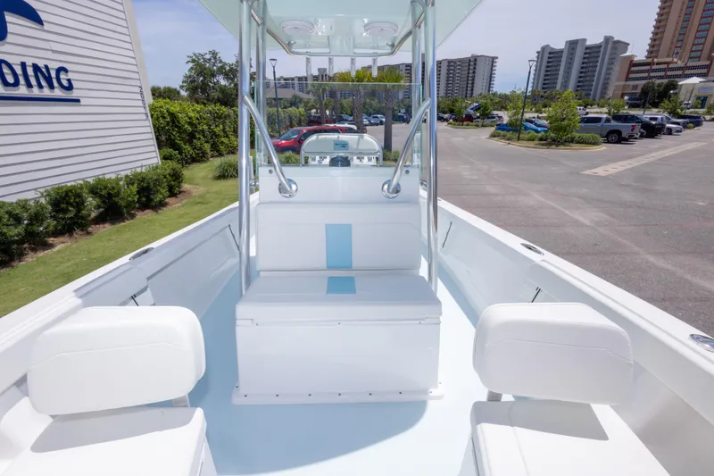 Slide: The Image of 2026 Albury Brothers 23 Forward Seating boat in a parking lot, showcasing sleek design and seating. - 35