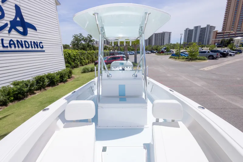 Slide: The Image of 2026 Albury Brothers 23 Forward Seating boat at marina with modern buildings. - 39