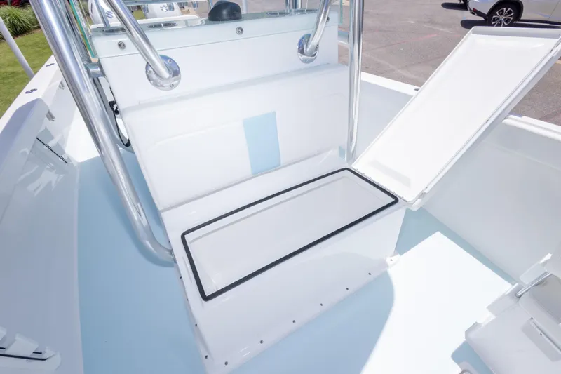 Slide: The Image of 2026 Albury Brothers 23 Forward Seating boat interior with open storage compartment. - 41