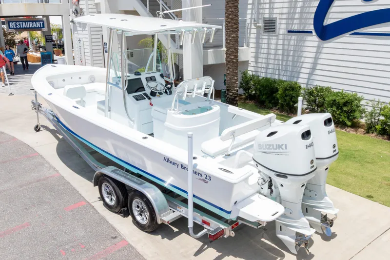 Slide: The Image of 2026 Albury Brothers 23 Forward Seating boat with twin Suzuki engines on a trailer. - 5