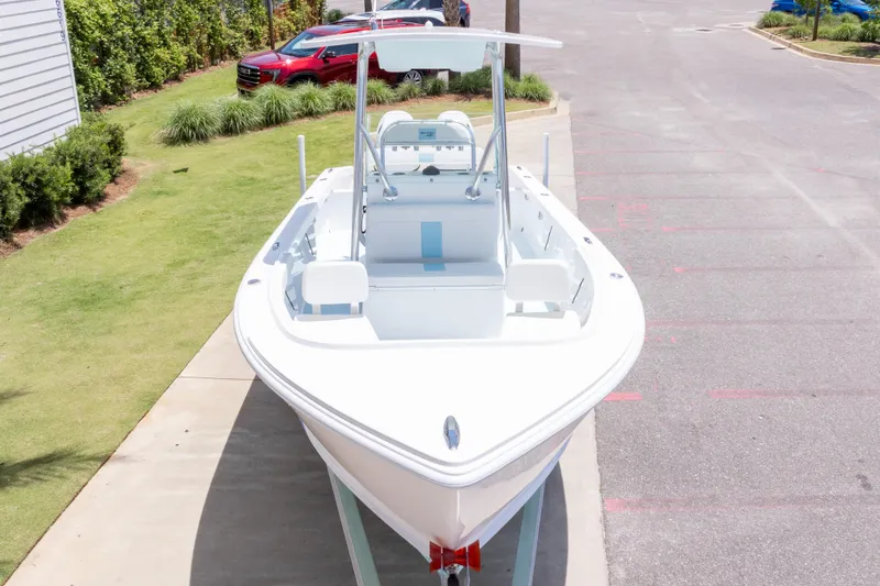 Slide: The Image of 2026 Albury Brothers 23 Forward Seating boat displayed outdoors on a sunny day. - 6