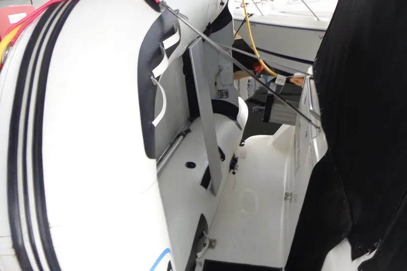 Slide: The Image of 2007 Bayliner 285 boat interior with seating and equipment, featuring a sleek design. - 51
