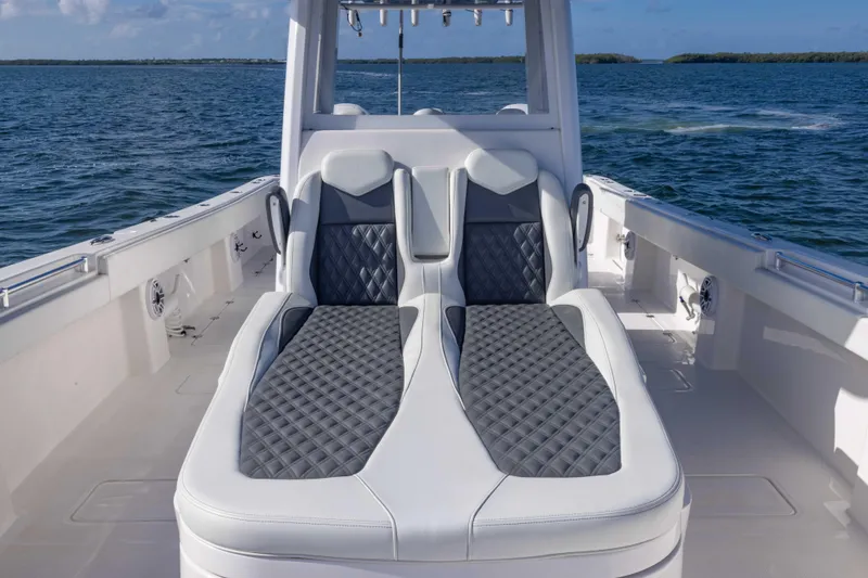 Slide: The Image of Luxurious seating on 2023 Invincible 35 Catamaran, featuring sleek design and ocean backdrop. - 20