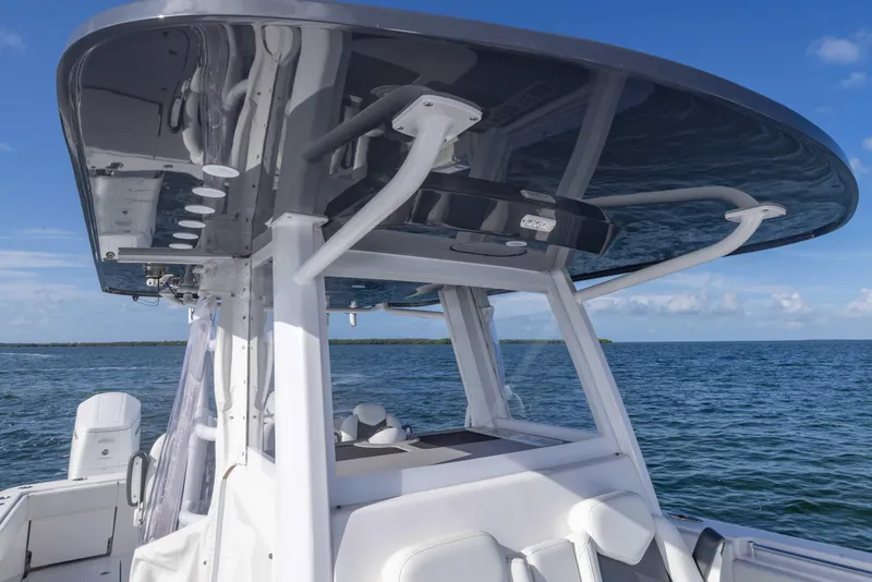 Slide: The Image of 2023 Invincible 35 Catamaran, sleek design, ocean view, modern helm station. - 21