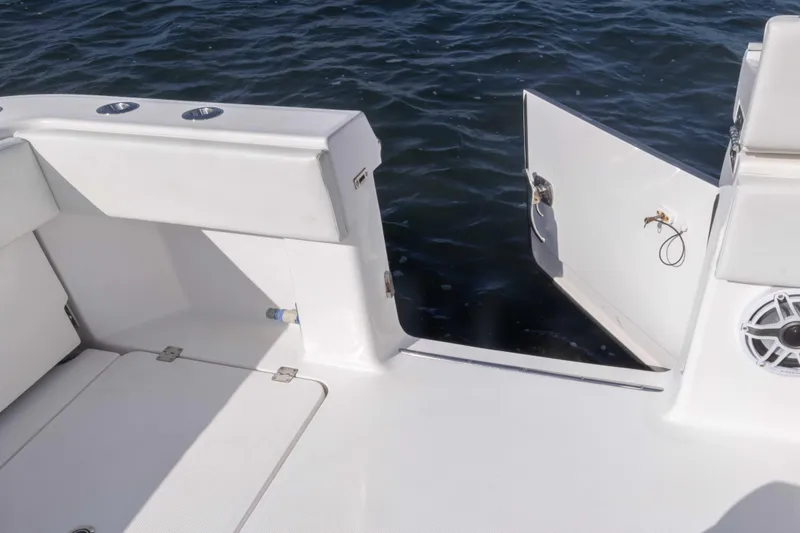 Slide: The Image of 2023 Invincible 35 Catamaran deck with open side door and ocean view. - 37