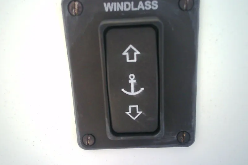 Slide: The Image of Windlass control switch on 2021 Glasstream 240 CCX boat dashboard. - 17