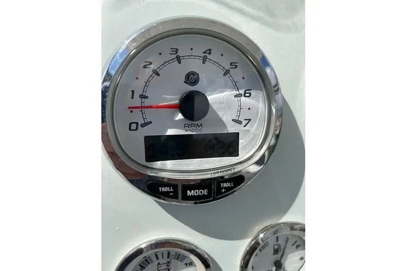 Slide: The Image of Tachometer of 2021 Glasstream 240 CCX showing RPM. - 21