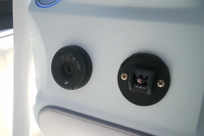 Slide: The Image of Dashboard controls on a 2021 Glasstream 240 CCX boat. - 26