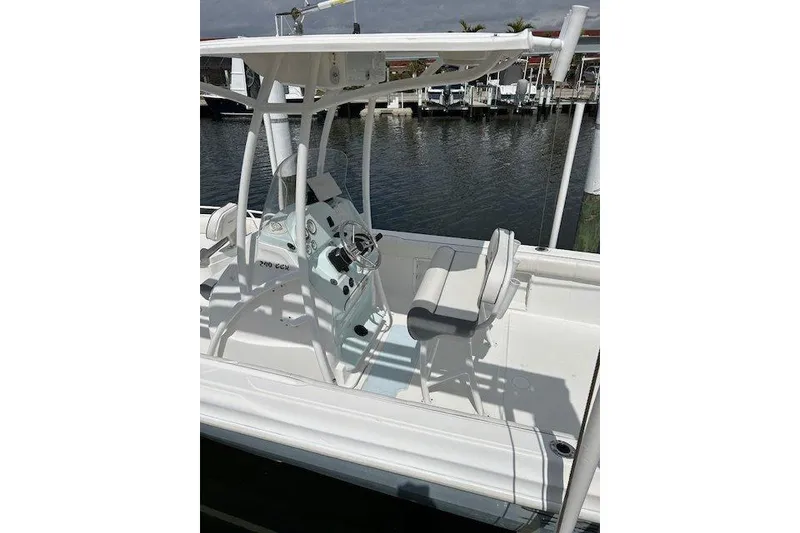 Slide: The Image of 2021 Glasstream 240 CCX boat anchor system by the water. - 3