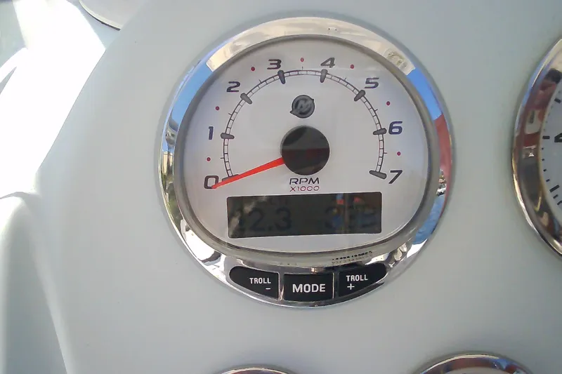Slide: The Image of Tachometer of 2021 Glasstream 240 CCX boat displaying RPM and digital readout. - 48