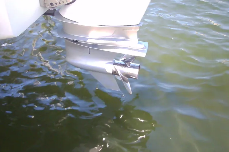 Slide: The Image of Outboard motor of 2021 Glasstream 240 CCX boat in water. - 58