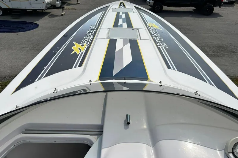 Slide: The Image of 2001 Donzi boat deck with sleek design and bold graphics. - 15