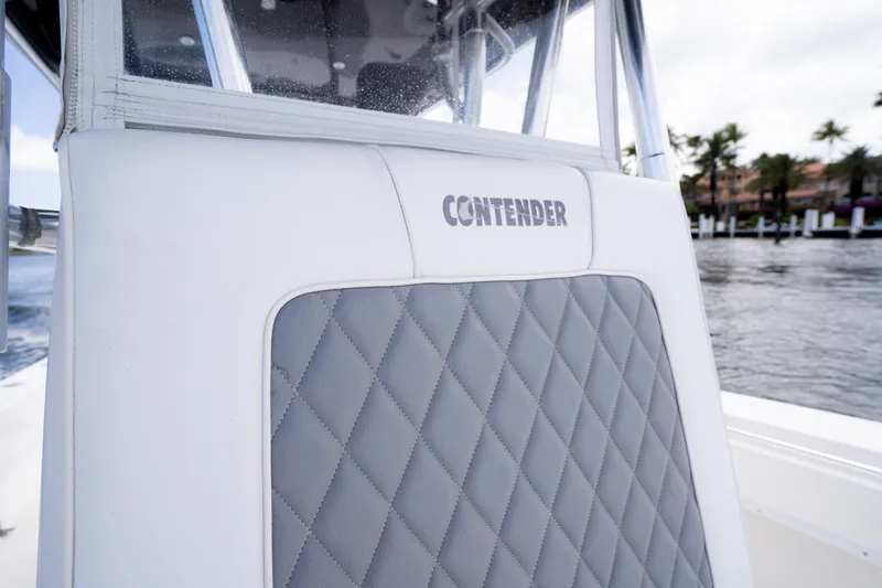 Slide: The Image of 2014 Contender 35 ST boat interior with quilted upholstery and logo. - 19