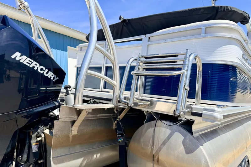 Slide: The Image of 2019 Crestliner 240 Rally DX CW pontoon boat with Mercury outboard motor. - 19