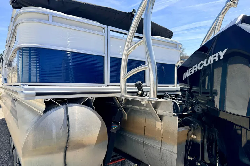 Slide: The Image of 2019 Crestliner 240 Rally DX CW pontoon boat with Mercury outboard motor. - 20