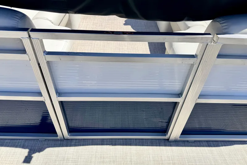 Slide: The Image of 2019 Crestliner 240 Rally DX CW pontoon boat interior with aluminum railing. - 22