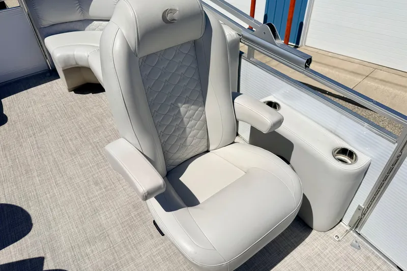 Slide: The Image of 2019 Crestliner 240 Rally DX CW boat seat with quilted design and cup holders. - 42