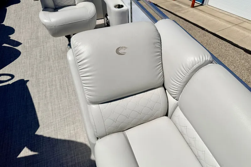 Slide: The Image of Luxurious seating on 2019 Crestliner 240 Rally DX CW boat, featuring elegant white upholstery. - 54