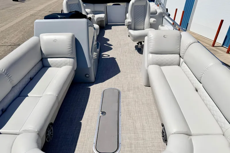 Slide: The Image of 2019 Crestliner 240 Rally DX CW pontoon boat with spacious seating and modern design. - 65