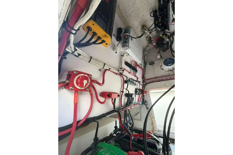 Slide: The Image of Electrical wiring setup inside a 1992 Baja 280 Sportfish boat. - 15