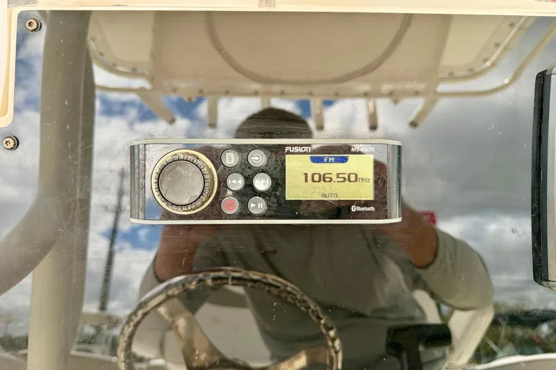 Slide: The Image of Fusion MS-RA70 radio display on 2018 Skeeter SX2250 boat, tuned to 106.50 MHz FM. - 15