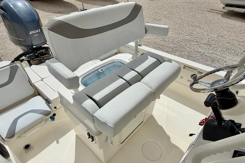 Slide: The Image of 2018 Skeeter SX2250 boat interior with seating and Yamaha 200 engine. - 20