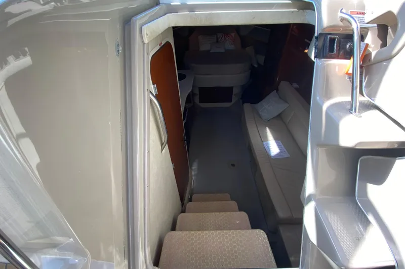 Slide: The Image of Interior view of 2008 Sea Ray Sundancer 330 cabin with seating and stairs. - 39