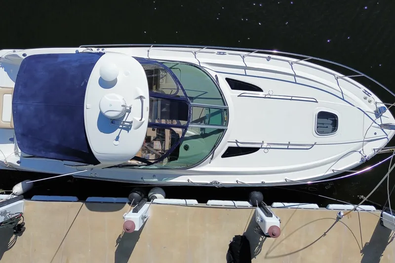 Slide: The Image of Top view of a 2008 Sea Ray Sundancer 330 yacht docked at a marina. - 61