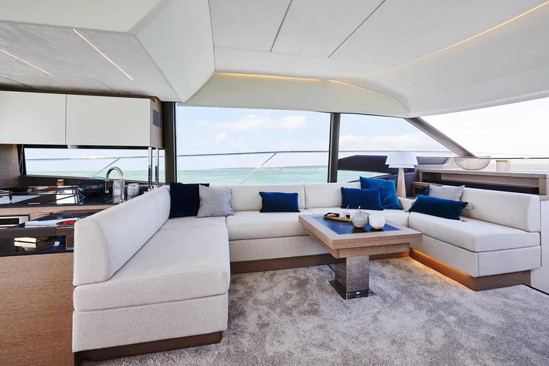 Slide: The Image of Luxurious bedroom interior of 2020 Prestige 590 yacht with modern lighting and elegant decor. - 17