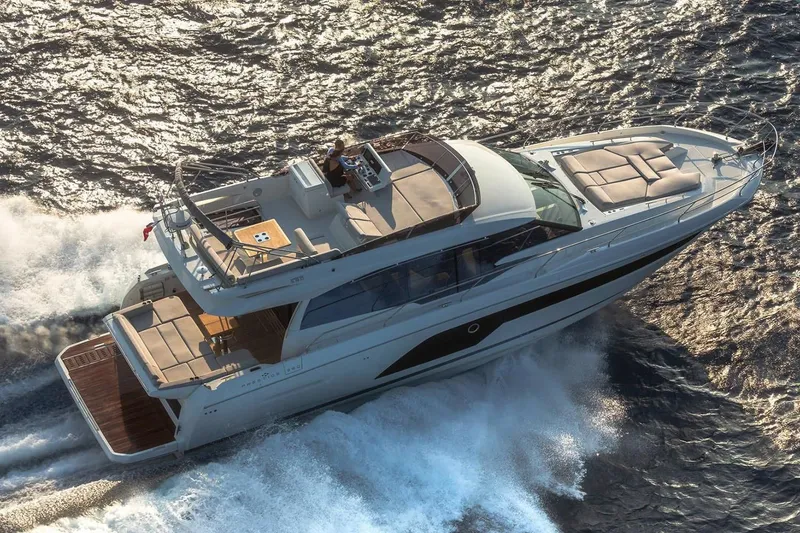 Slide: The Image of Interior view of 2020 Prestige 590 yacht with ocean backdrop. - 7