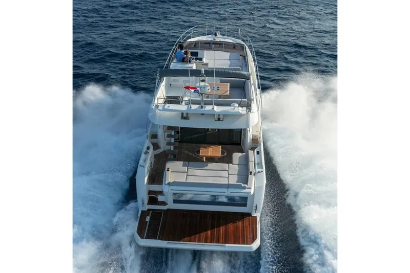 Slide: The Image of Modern kitchen on a 2020 Prestige 590 yacht with ocean view. - 8