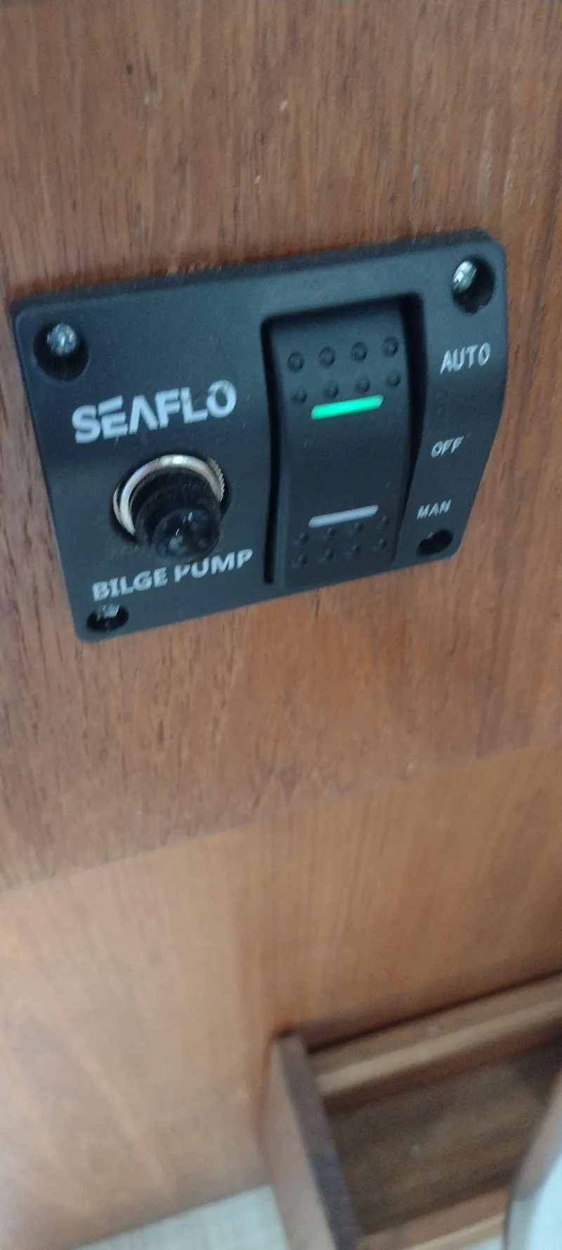 Slide: The Image of Seaflo bilge pump switch in Carver 32 Convertible, 1989. - 17