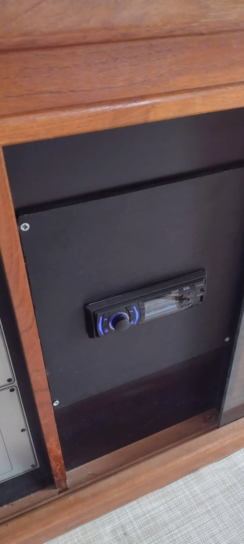 Slide: The Image of Interior of 1989 Carver 32 Convertible with wood paneling. - 22