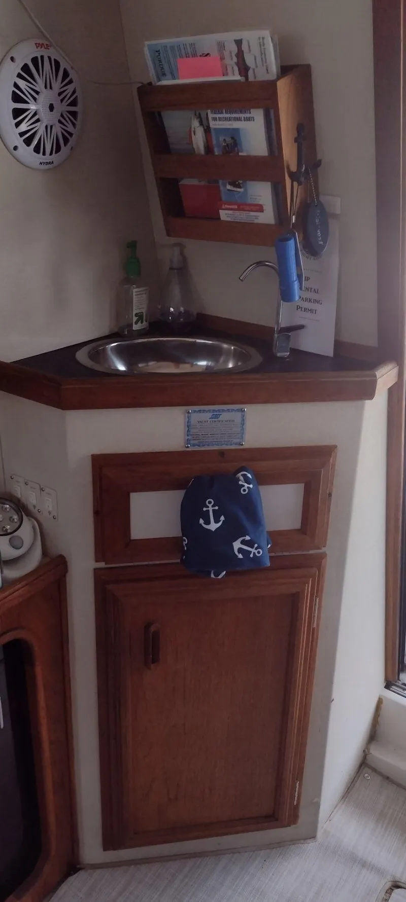 Slide: The Image of Galley area in a 1989 Carver 32 Convertible yacht. - 25