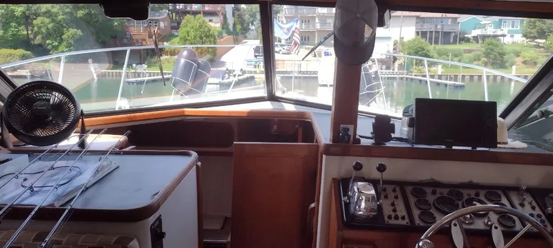 Slide: The Image of Interior view of a 1989 Carver 32 Convertible boat. - 28