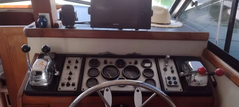 Slide: The Image of Dashboard of a 1989 Carver 32 Convertible boat. - 37