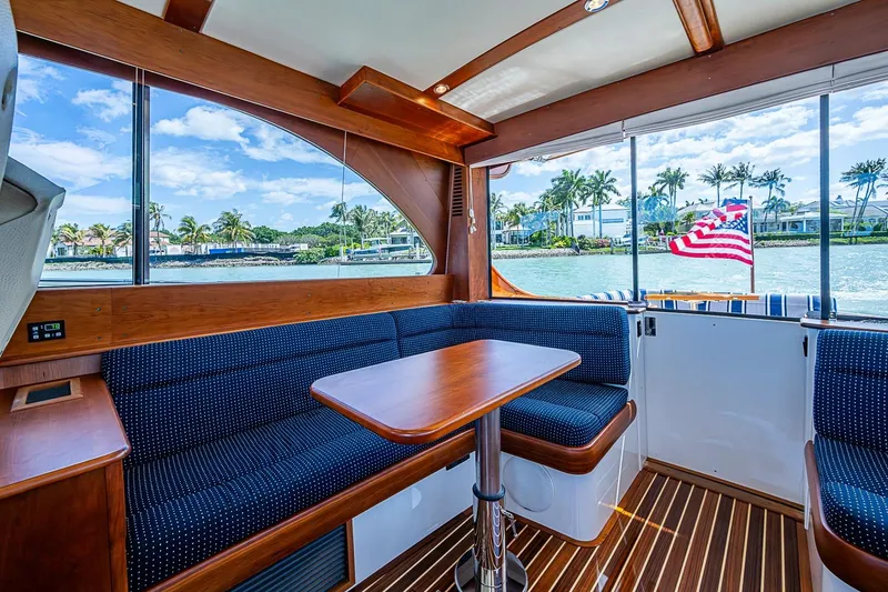 Slide: The Image of Luxurious interior of 2021 Hinckley Talaria 43 yacht with scenic waterfront view. - 50