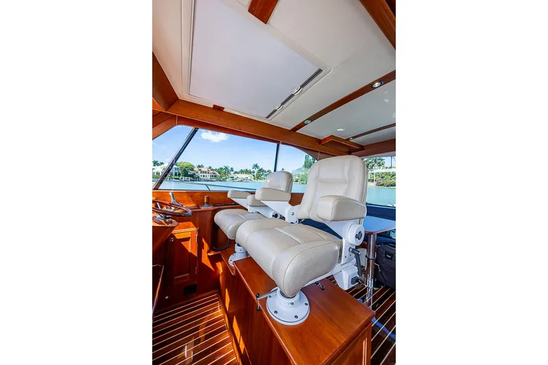 Slide: The Image of Interior of 2021 Hinckley Talaria 43 yacht with luxurious helm seating. - 61