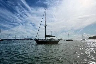Slide: The Image of Sailboat on calm water under a cloudy sky, Morris Linda 1987 model. - 13