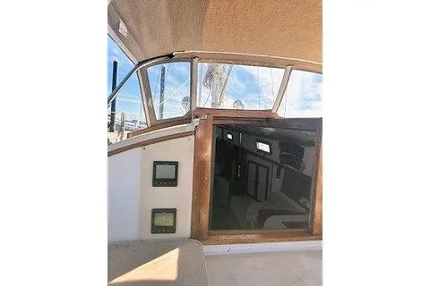 Slide: The Image of 1987 Morris Linda boat interior with wooden trim and navigation instruments. - 16