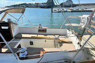Slide: The Image of Sailboat cockpit view, Morris Linda 1987, docked in a sunny marina. - 22