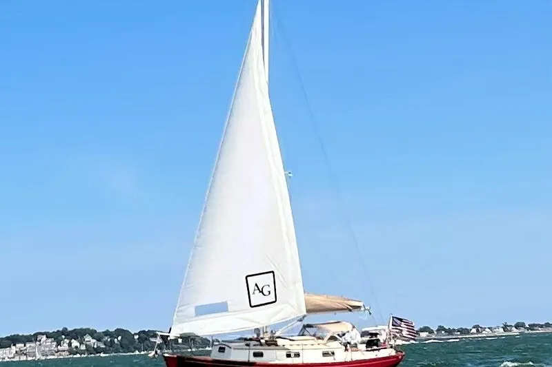 Slide: The Image of Sailboat on open water, Morris Linda 1987 model, with clear blue sky background. - 3