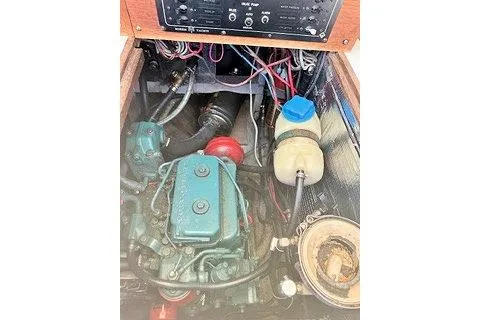 Slide: The Image of Engine compartment of a 1987 Morris Linda, showcasing wiring and components. - 37
