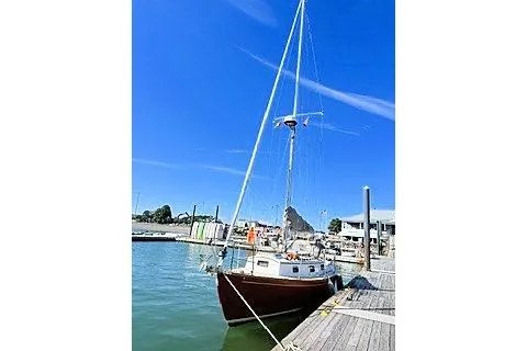 Slide: The Image of Sailboat docked at marina, Morris Linda 1987 model, under clear blue sky. - 5