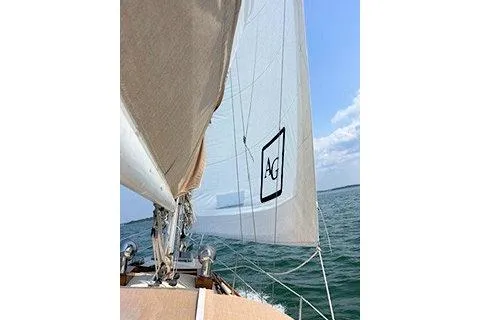 Slide: The Image of Sailboat on open water, Morris Linda 1987, with clear blue sky. - 8