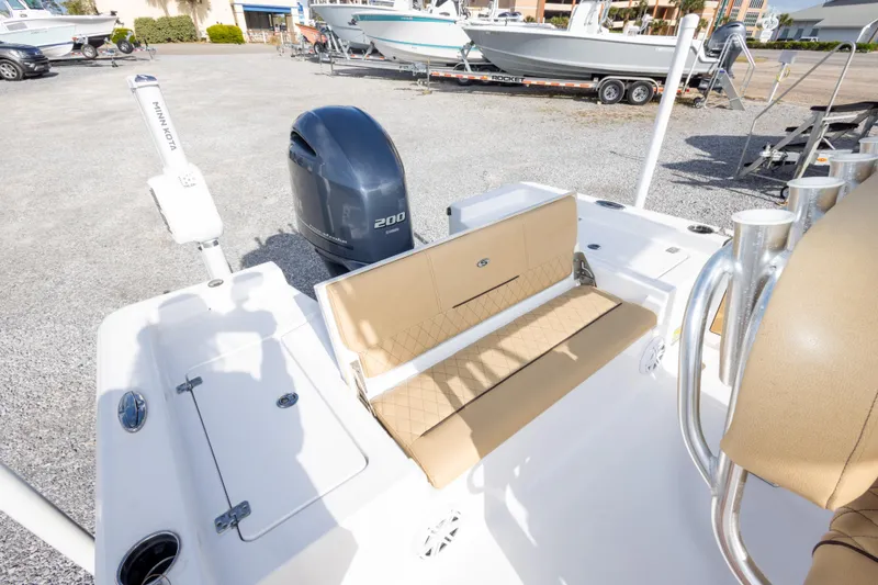 Slide: The Image of 2021 Sportsman Masters 227 Bay Boat with Yamaha 200 engine, parked outdoors. - 18