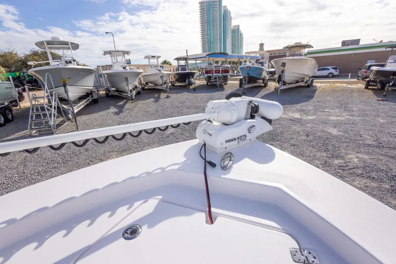 Slide: The Image of 2021 Sportsman Masters 227 Bay Boat with open storage compartments on deck. - 28