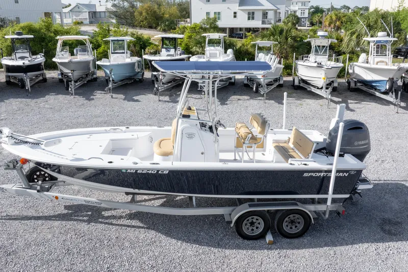 Slide: The Image of 2021 Sportsman Masters 227 Bay Boat with Yamaha engine on trailer in dealership lot. - 38